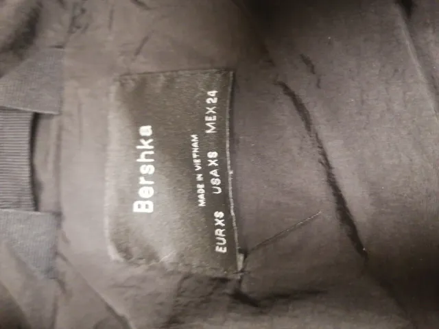 Abrigo acolchado negro niña