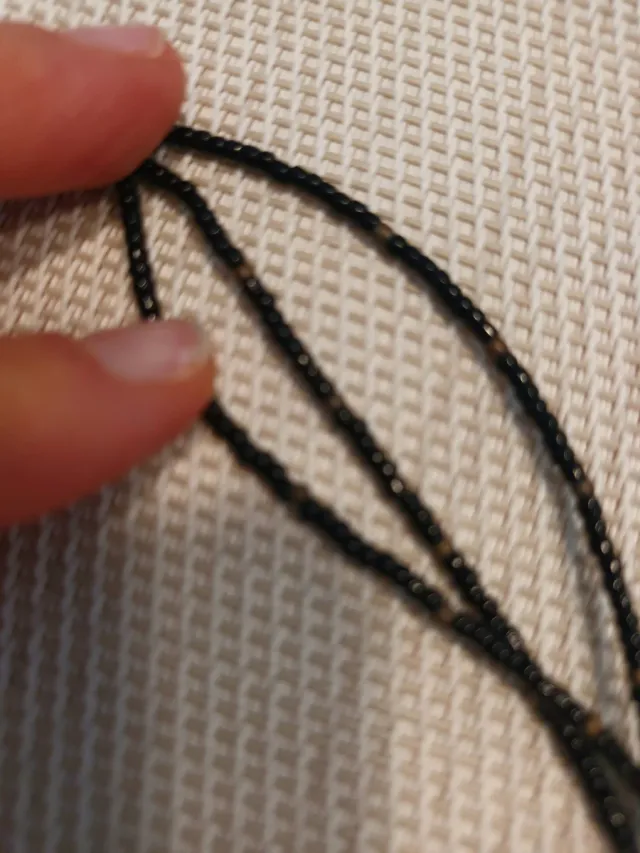 Gargantilla triple bolitas negras