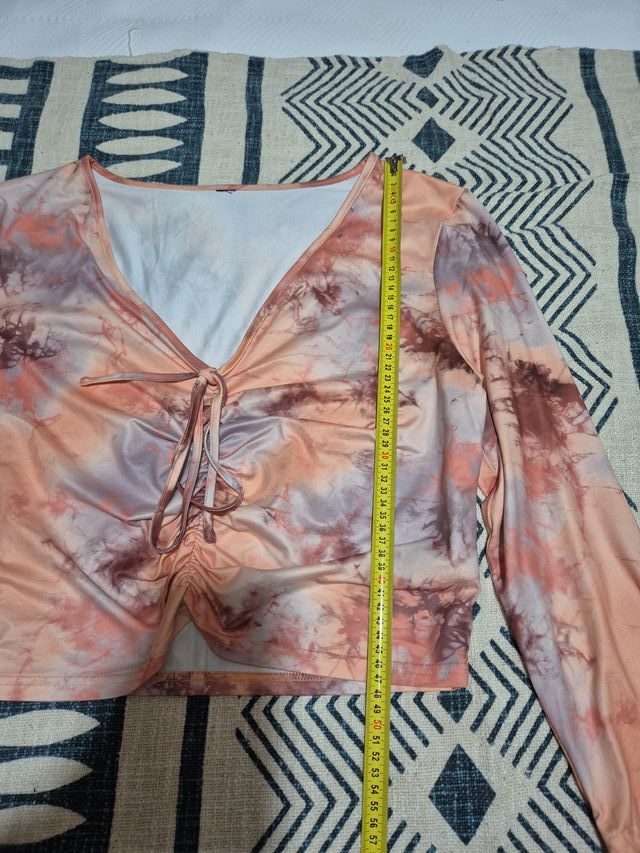 Top manga larga con cordones