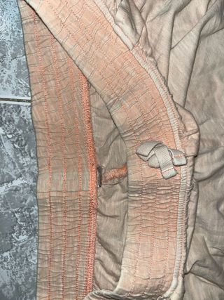 Pantalones cortos tono beige y naranja