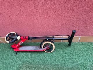 Patinete rojo Oxelo Mid9 plegable. Aluminio