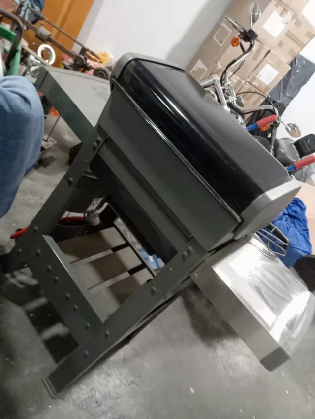 Barbacoa ,bombona ,cepillo más pinzas,marca Weber