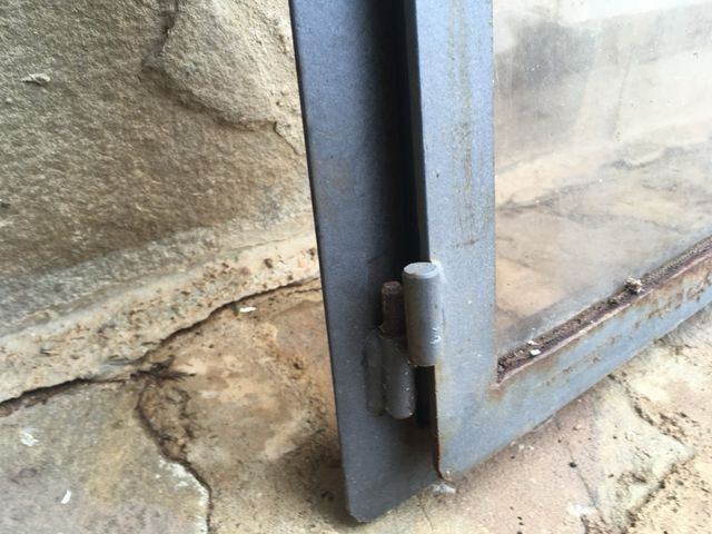 Puerta de chimenea con cristal