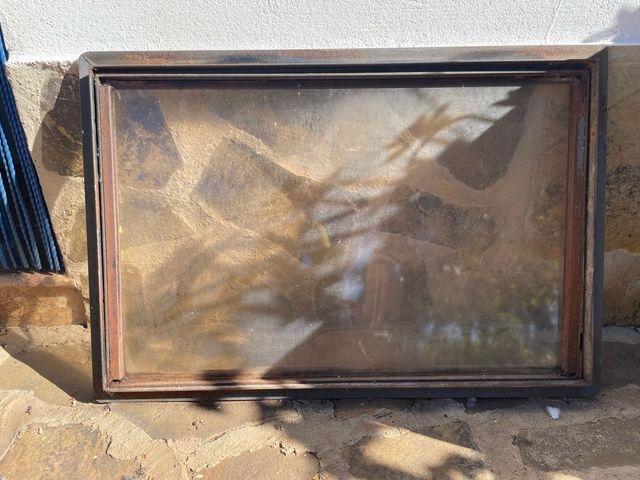 Puerta de chimenea con cristal