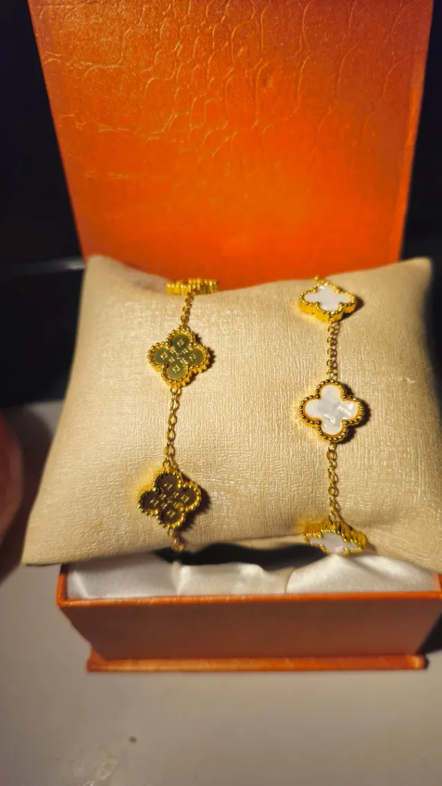 Pareja de pulseras trébol oro y blanco