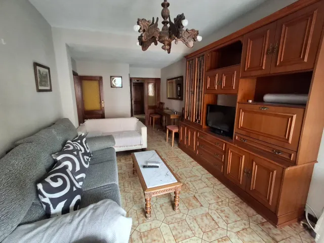 Divano in tessuto grigio e nero a 3 posti