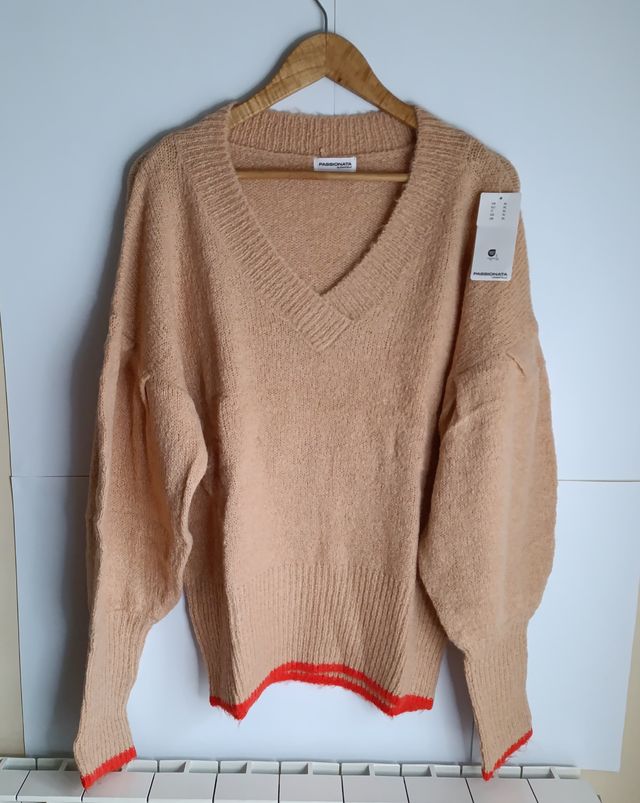 Jersey verde con detalles dorados