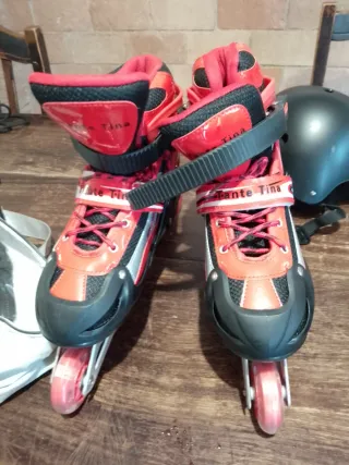 Pattini in linea rossi e neri