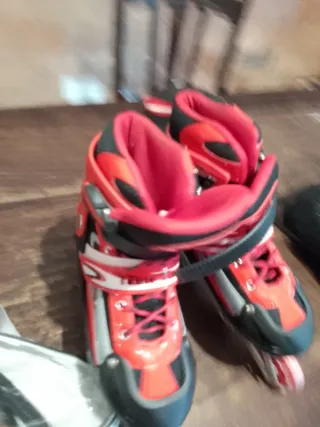 Pattini in linea rossi e neri