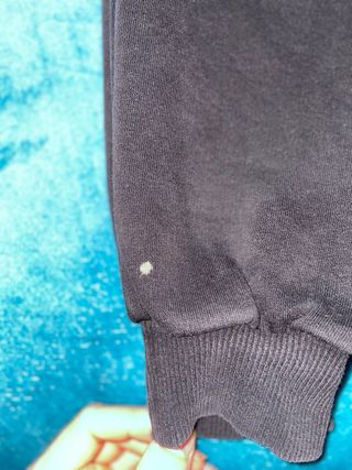 Tuta Nike nera con stampa floreale