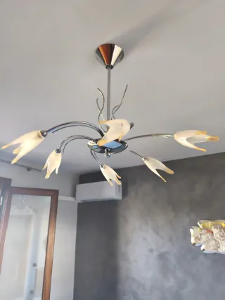 Lampadario in acciaio con vetri