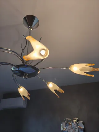 Lampadario in acciaio con vetri