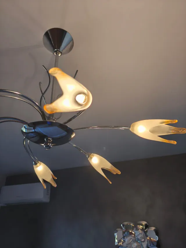 Lampadario in acciaio con vetri