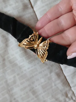 Collana vintage con farfalla dorata