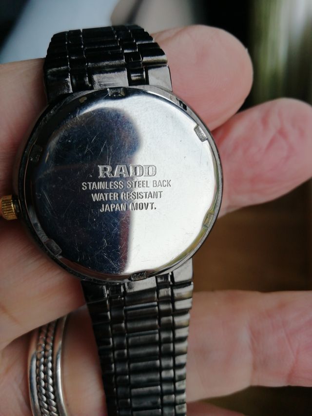 Reloj Rado Negro y Dorado