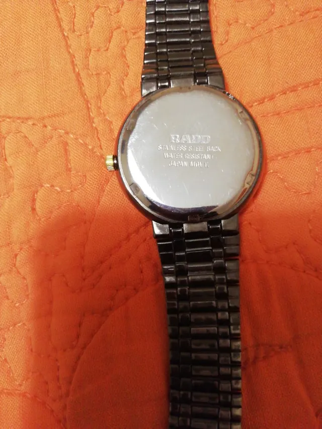 Reloj Rado Negro y Dorado