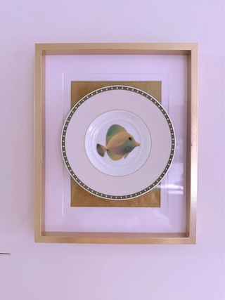 Quadro com prato e peixe decorativo