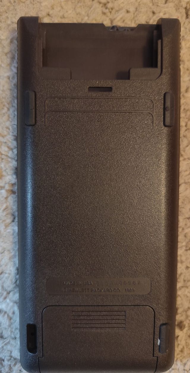 Calculadora HP 48SX con funda y manual