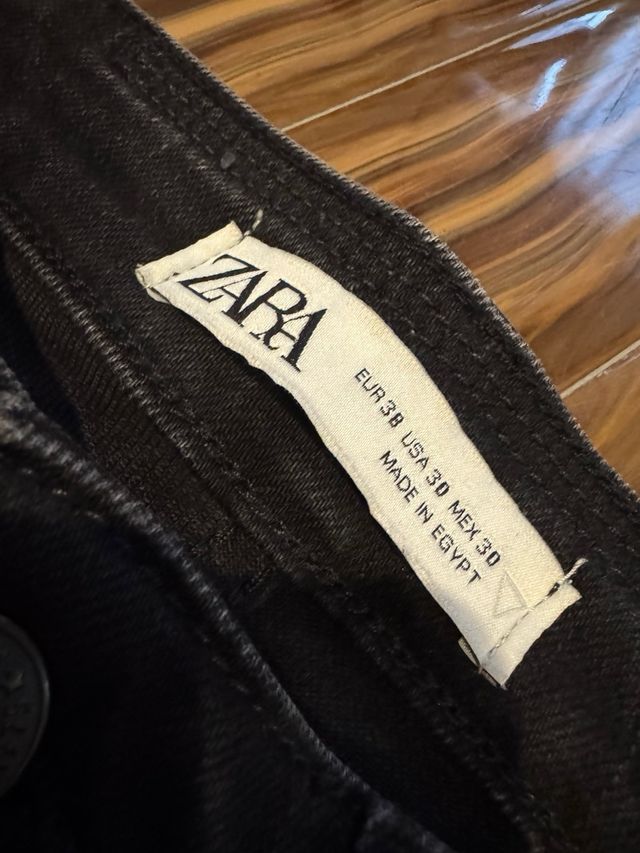 Jeans neri strappati