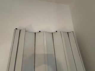 Puerta plegable plástica con tirador