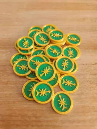 Monedas y Fichas Arnak (Brujulas) 36 de cada tipo.