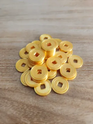 Monedas y Fichas Arnak (Brujulas) 36 de cada tipo.