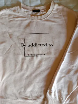 Sudadera beige ISOU con mensaje