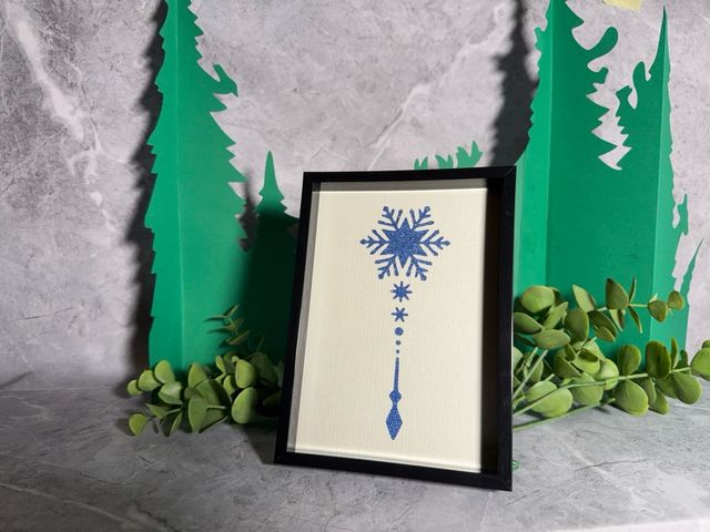 Marco de diseño con copo de nieve