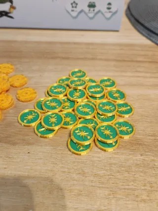 Monedas y brújulas Arnak