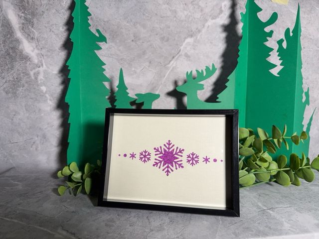 Marco de fotos con diseño de copos de nieve