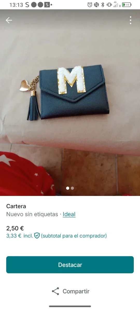 Cartera negra con inicial M