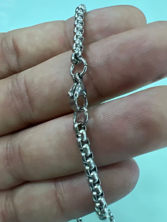 Catena in argento con pugnale cromato a forma di cuore