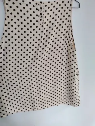 Camiseta sin mangas lunares