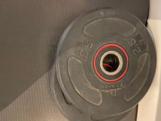 Banco de pesas Corength y discos