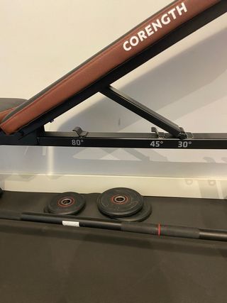 Banco de pesas Corength y discos