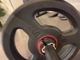 Banco de pesas Corength y discos