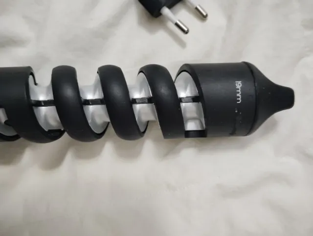 Rizador de pelo espiral negro y verde