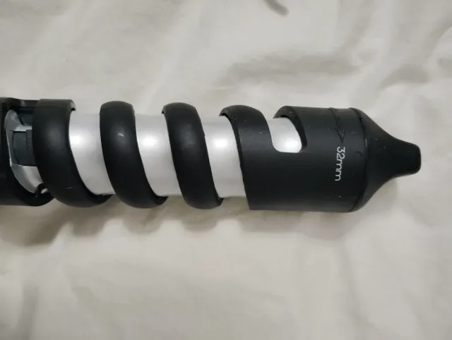 Rizador de pelo espiral negro y verde