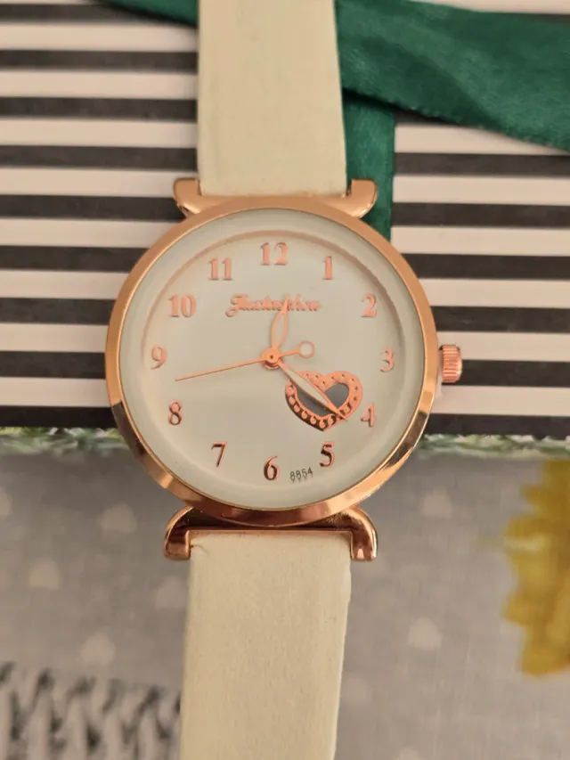 Reloj y pulsera de mujer.NUEVO .7,40 EUROS