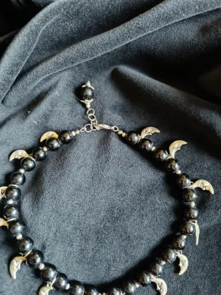 Collana con fasi lunari e perla bianca