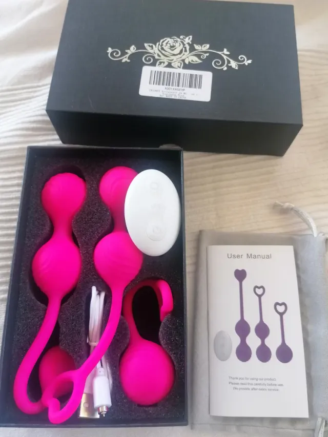 Masajeador suelo pélvico rosa y blanco