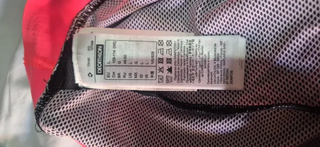 Pantalón corto deportivo Domyos negro y rosa