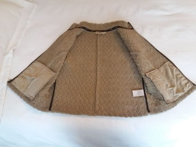 Chaleco acolchado marrón con cuello de borreguito