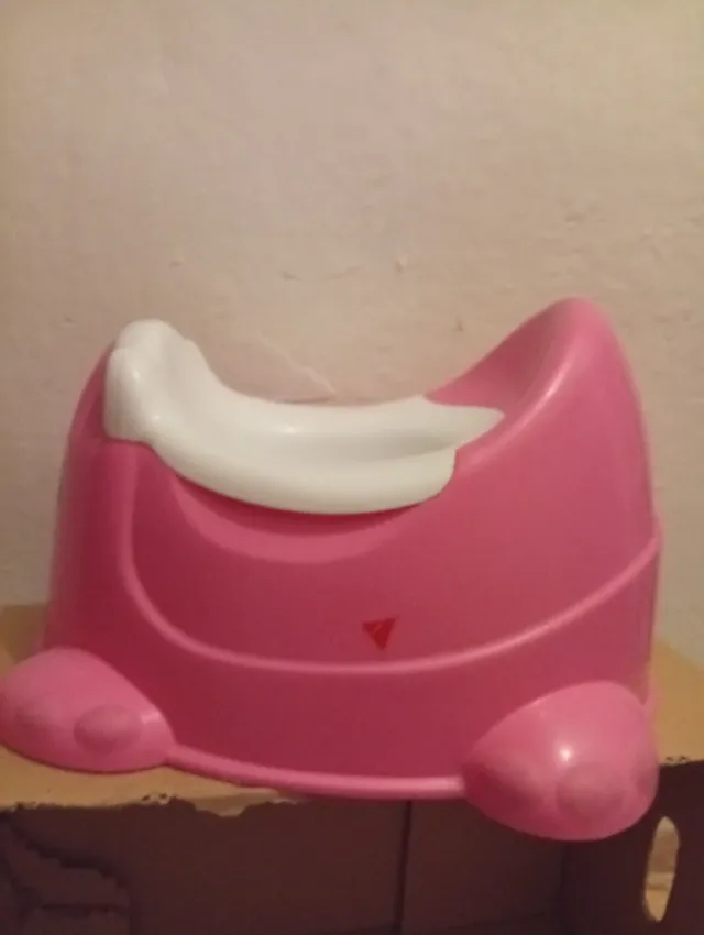 Orinal infantil rosa con diseño de oso