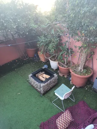 Stufa fatta a mano in pietra di fiume e acciaio 77 cm x 77 x 55