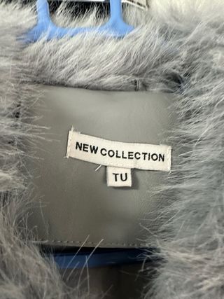 Chaqueta pelo gris con pedrería