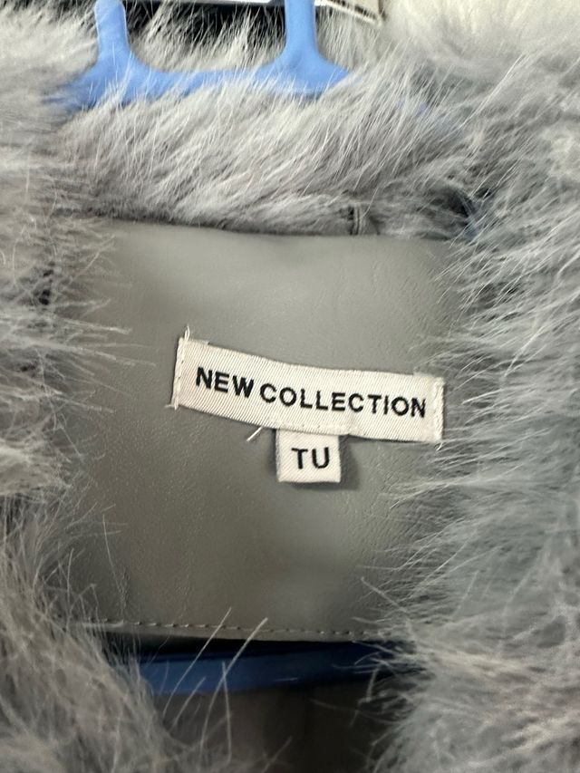 Chaqueta pelo gris con pedrería