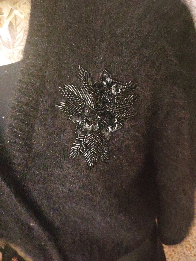 Cárdigan negro de punto con decoración