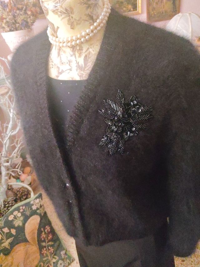 Cárdigan negro de punto con decoración