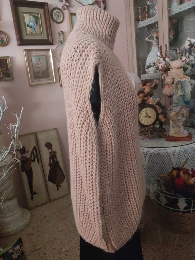 Chaleco punto cuello alto rosa claro